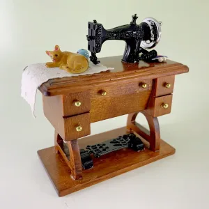 Sewing Machine Cat on Desk 01